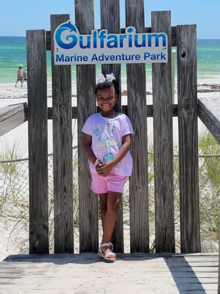 Wish Kid Imani visiting the beach for her wish trip